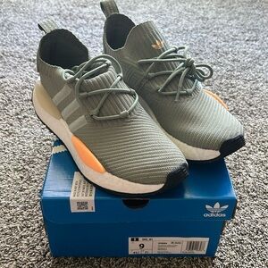 Adidas women’s size 9, NWT. Never worn